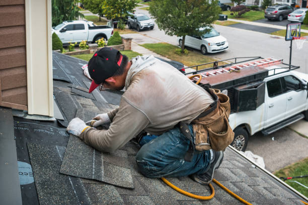 Professional Storm Damage Roof Repair technician working in Cranston, RI